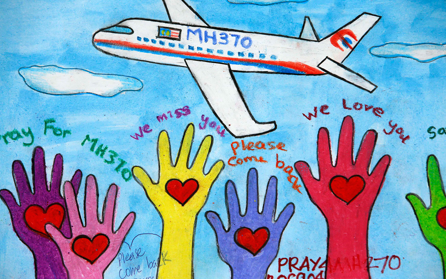 An artwork conveying well-wishes for the passengers and crew of the missing Malaysia Airlines Flight MH370 is seen at a viewing gallery in Kuala Lumpur International Airport March 19, 2014. REUTERS/Edgar Su (MALAYSIA - Tags: DISASTER TRANSPORT)